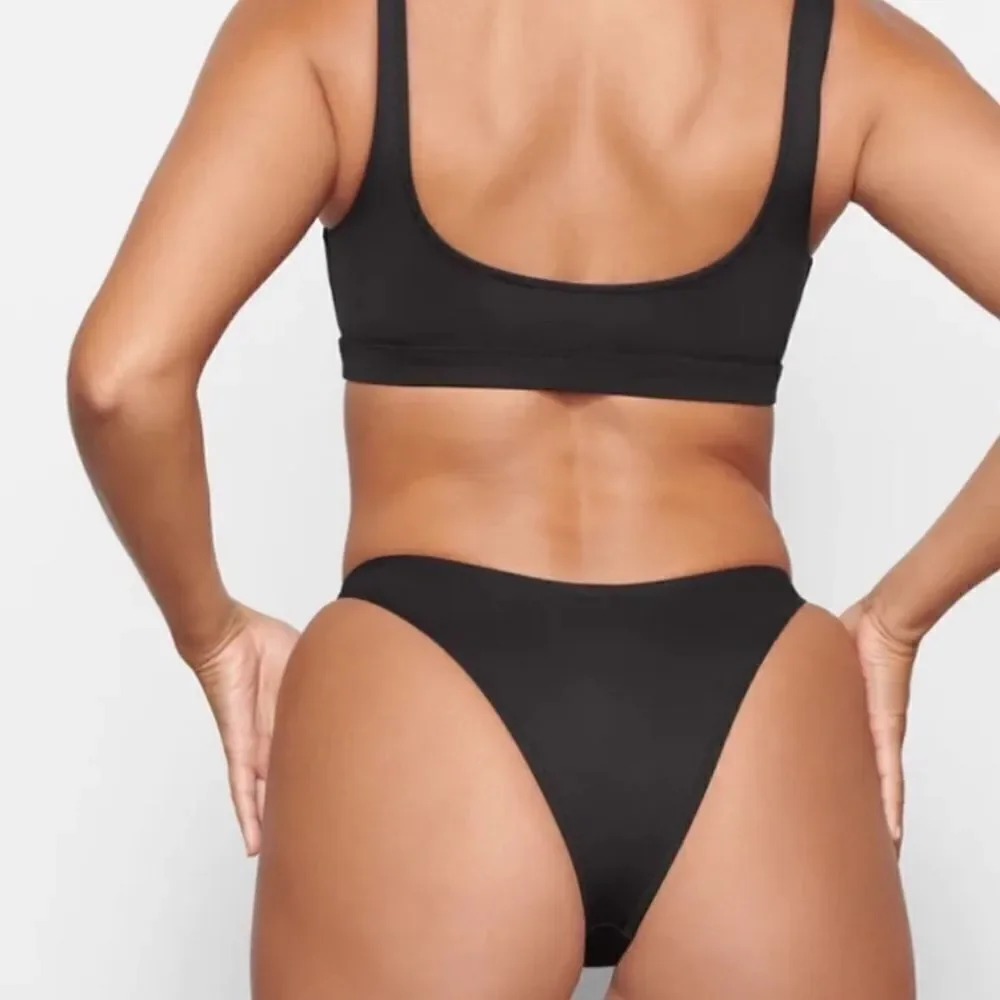 NWT SKIMS Recycled Swim Cheeky Tanga Bikini Bottom In Onyx Black